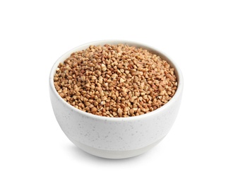 Photo of Bowl with uncooked buckwheat on white background