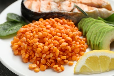 Photo of Healthy food high in vegetable fats on plate, closeup