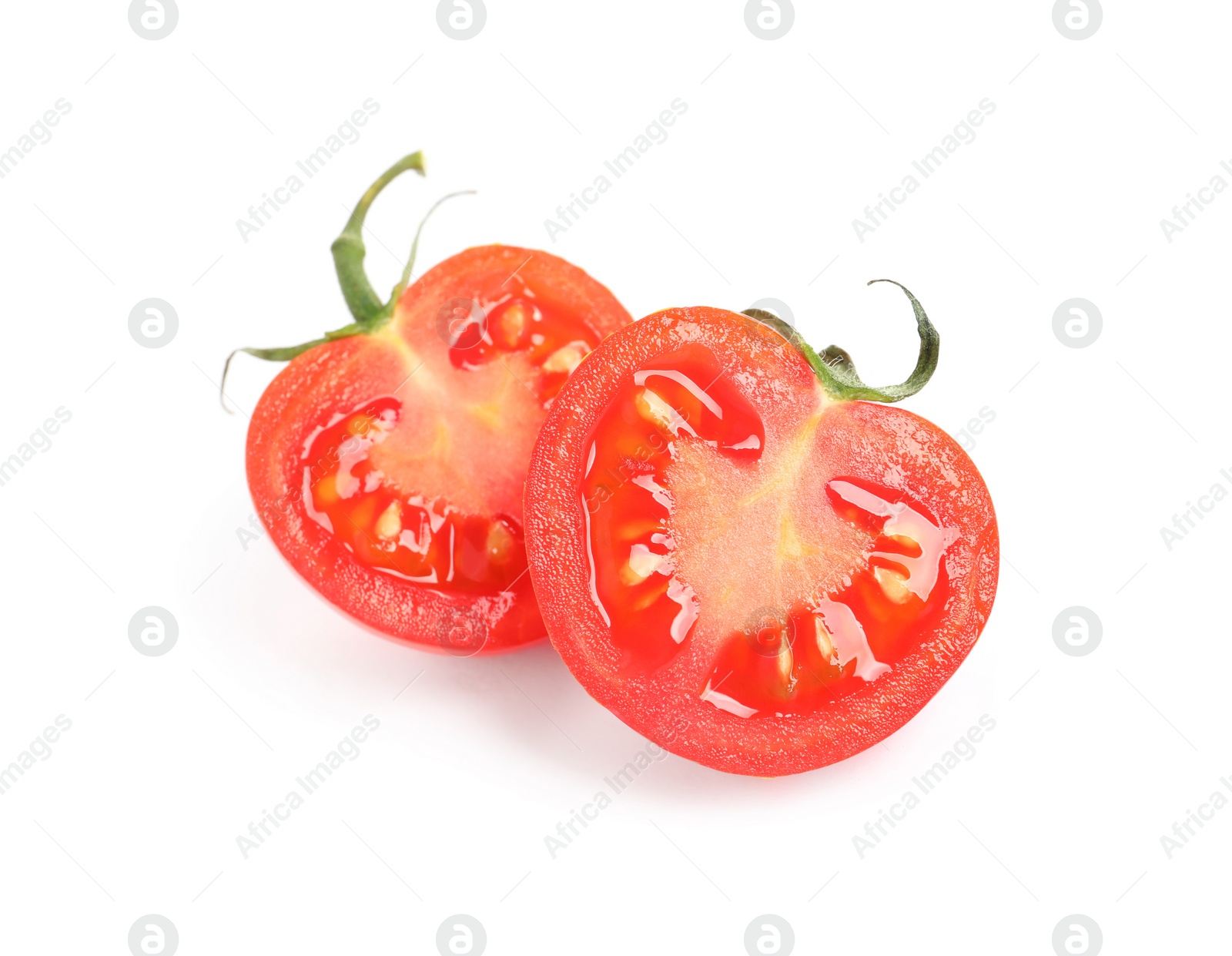 Photo of Halves of fresh cherry tomato isolated on white