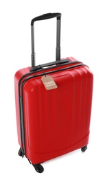 Photo of Red suitcase with TRAVEL INSURANCE label on white background