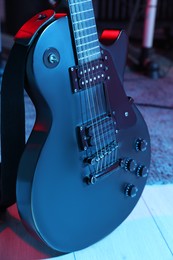 Photo of Electric guitar at recording studio, color toned. Music band practice