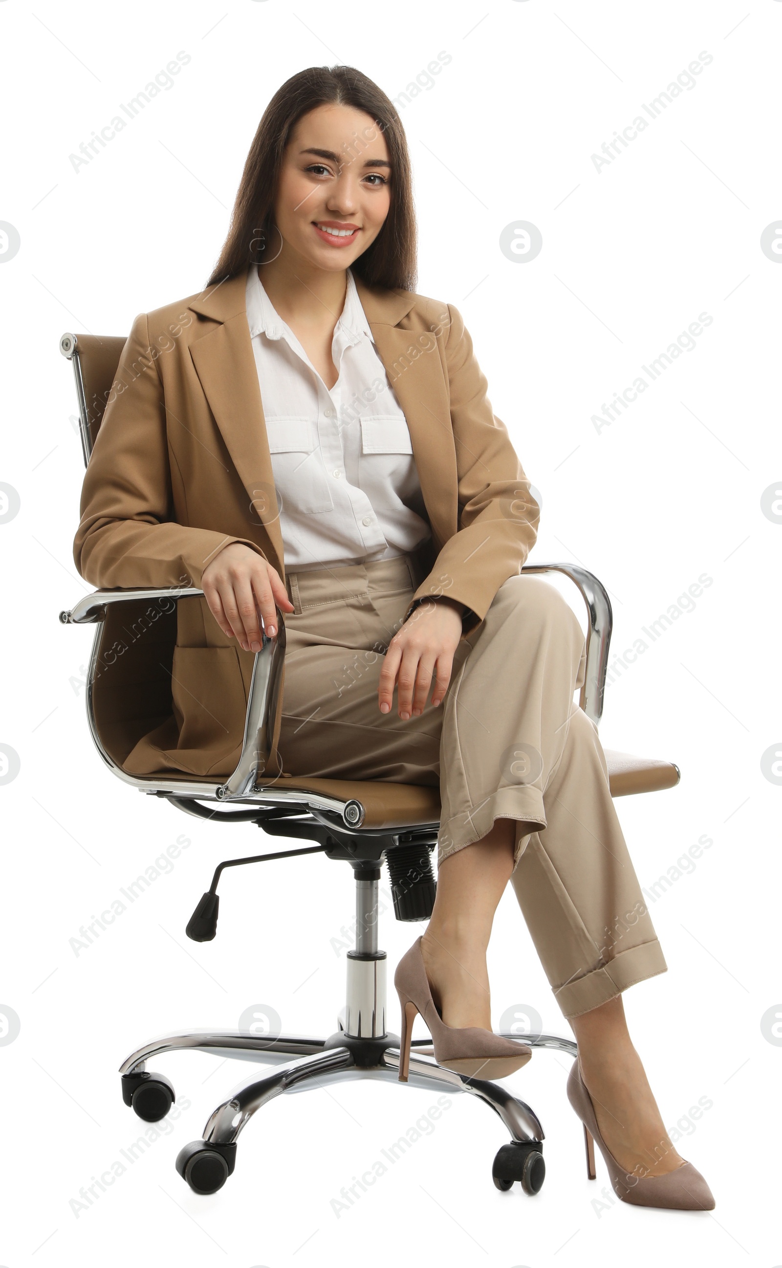 Photo of Young businesswoman sitting in comfortable office chair on white background