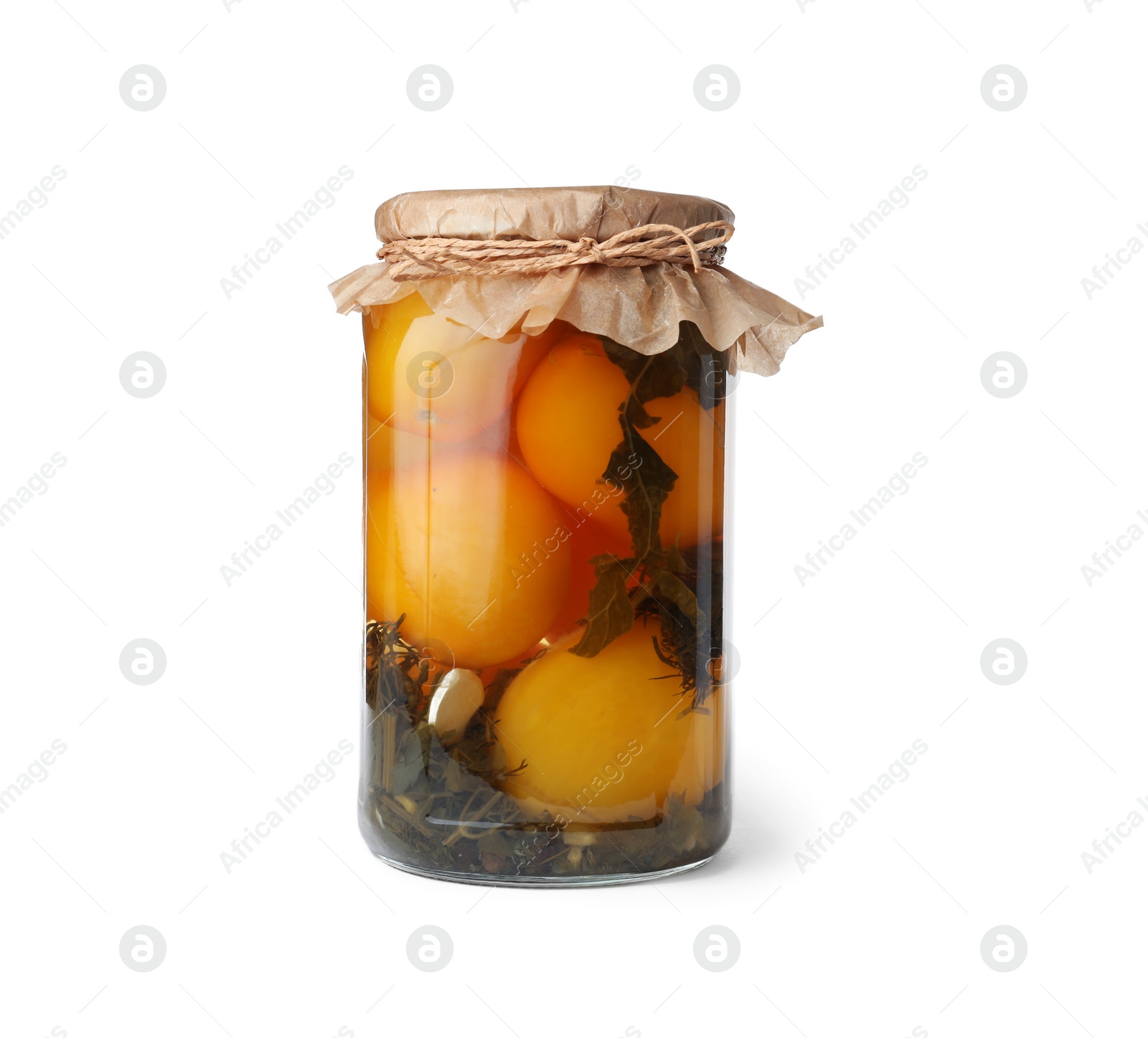 Photo of Jar with pickled yellow tomatoes on white background