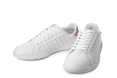 Pair of trendy sneakers on white background