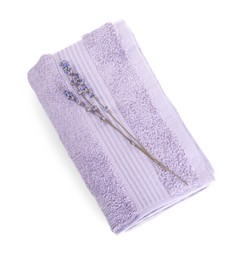 Folded violet terry towel and dry lavender isolated on white, top view