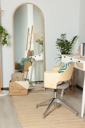 Photo of Modern room interior with large mirror and beautiful green plants