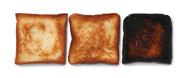Toasting doneness. Bread slices of different shades isolated on white, top view