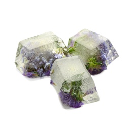 Ice cubes with flowers on white background