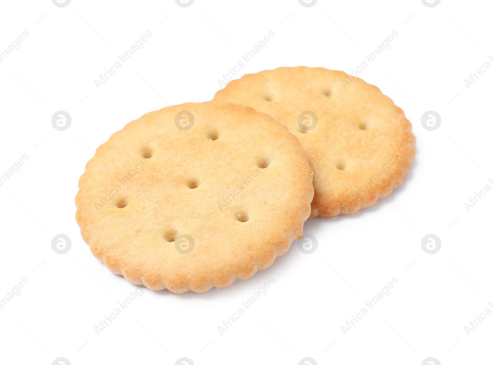 Photo of Two crispy crackers isolated on white. Delicious snack