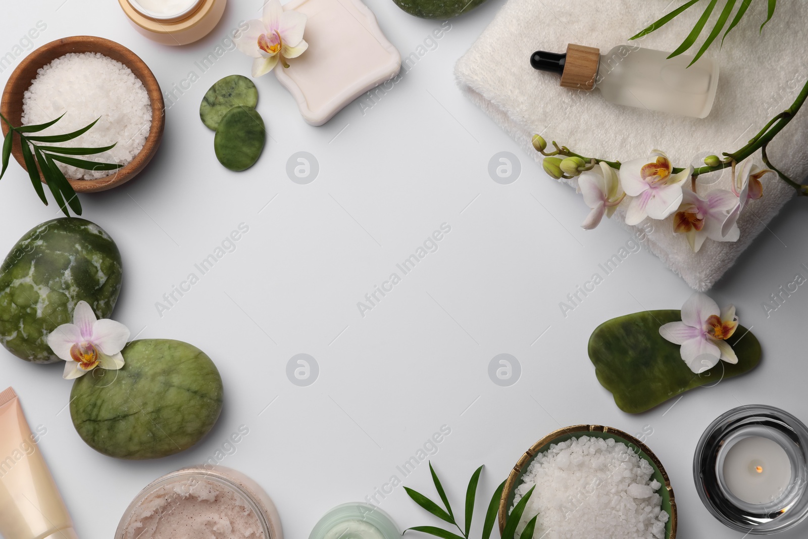 Photo of Flat lay composition with different spa products on white background. Space for text