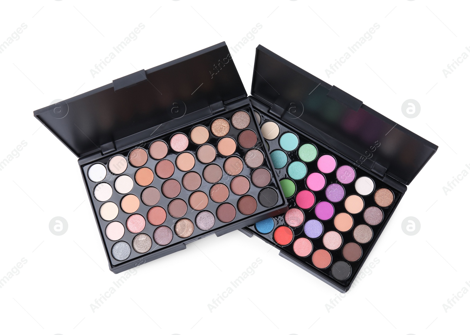 Photo of Beautiful eye shadow palettes isolated on white, top view