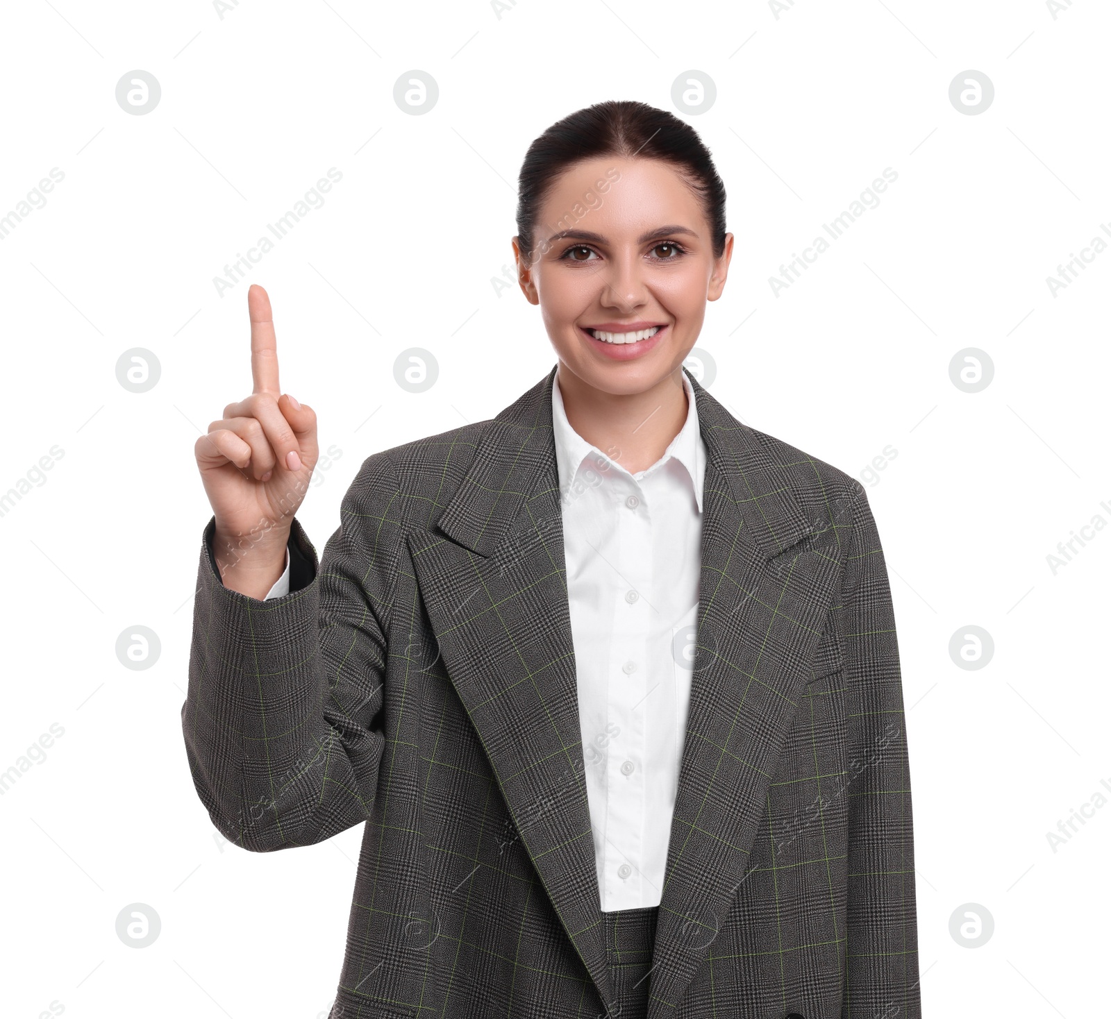 Photo of Beautiful businesswoman in suit pointing at something on white background