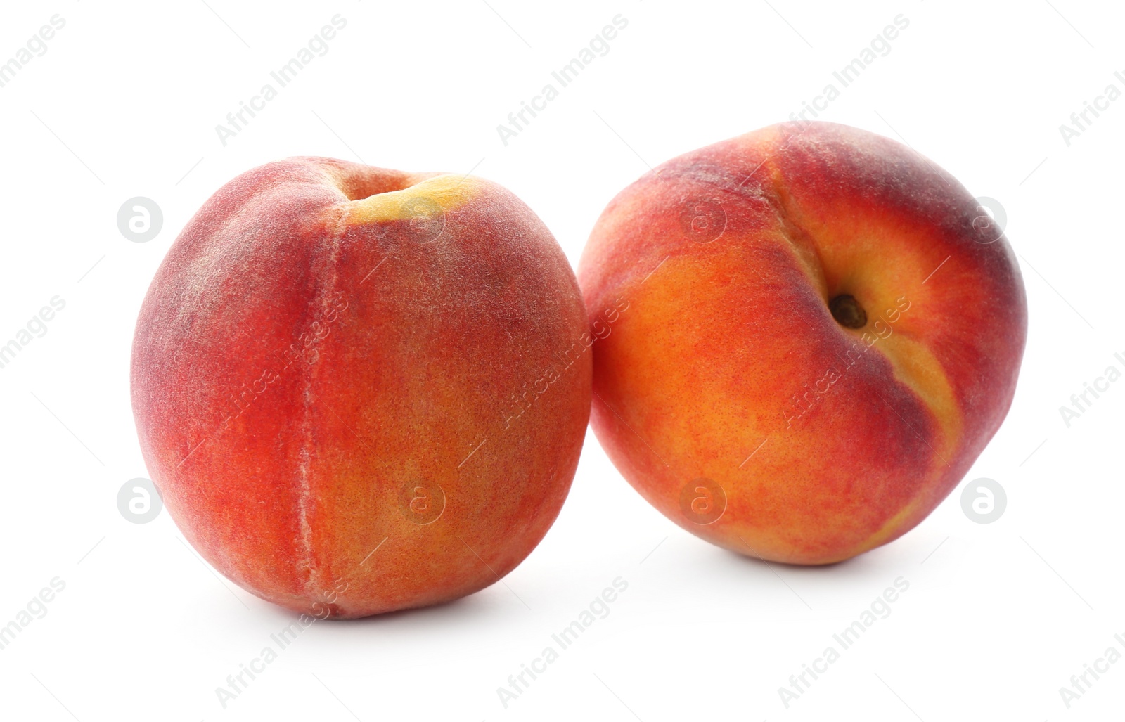 Photo of Delicious ripe juicy peaches isolated on white