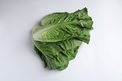 Photo of Fresh green romaine lettuces on white background, flat lay