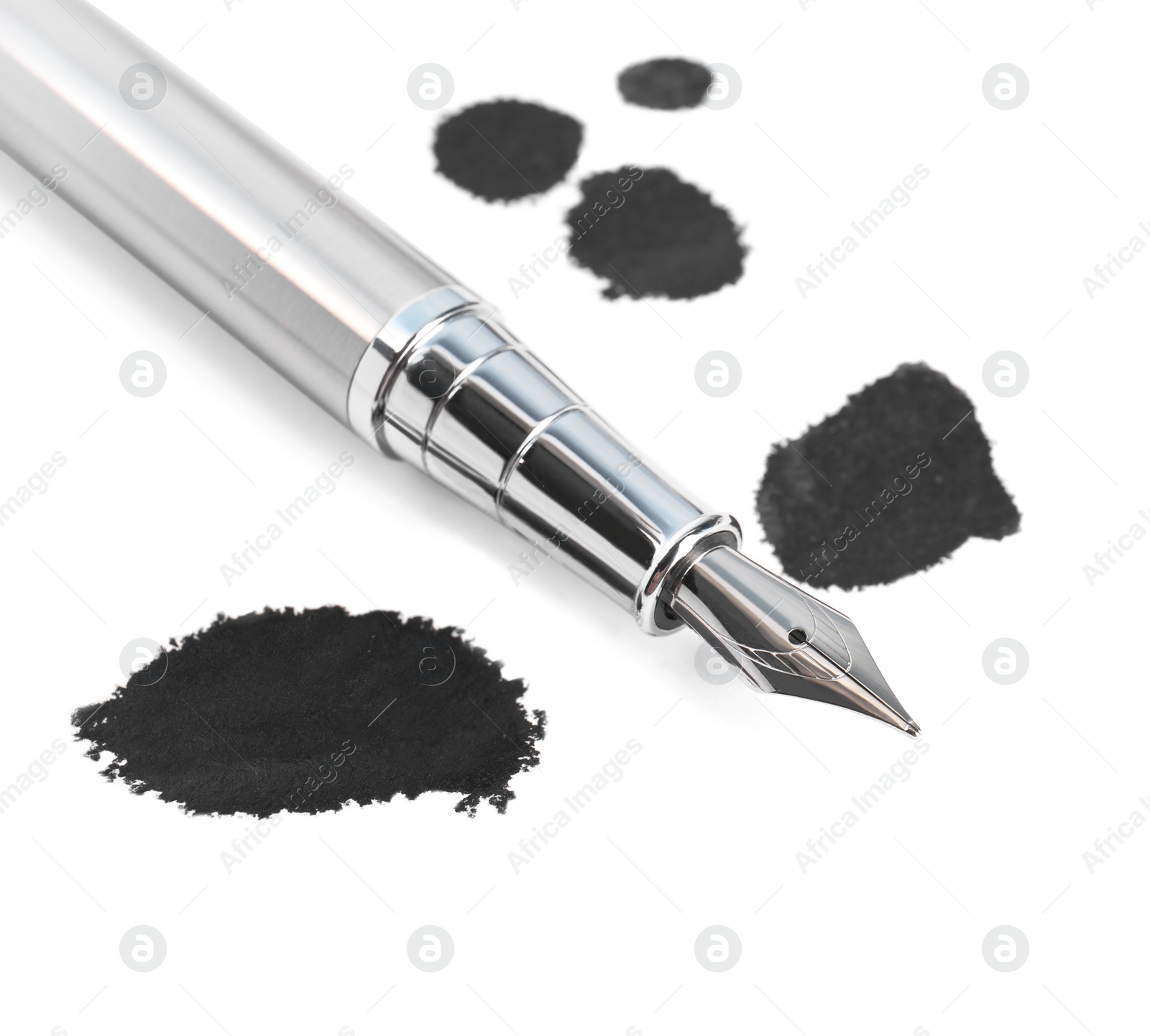 Photo of Stylish silver fountain pen and blots of ink isolated on white