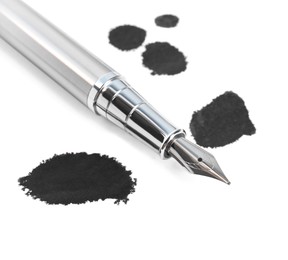 Stylish silver fountain pen and blots of ink isolated on white