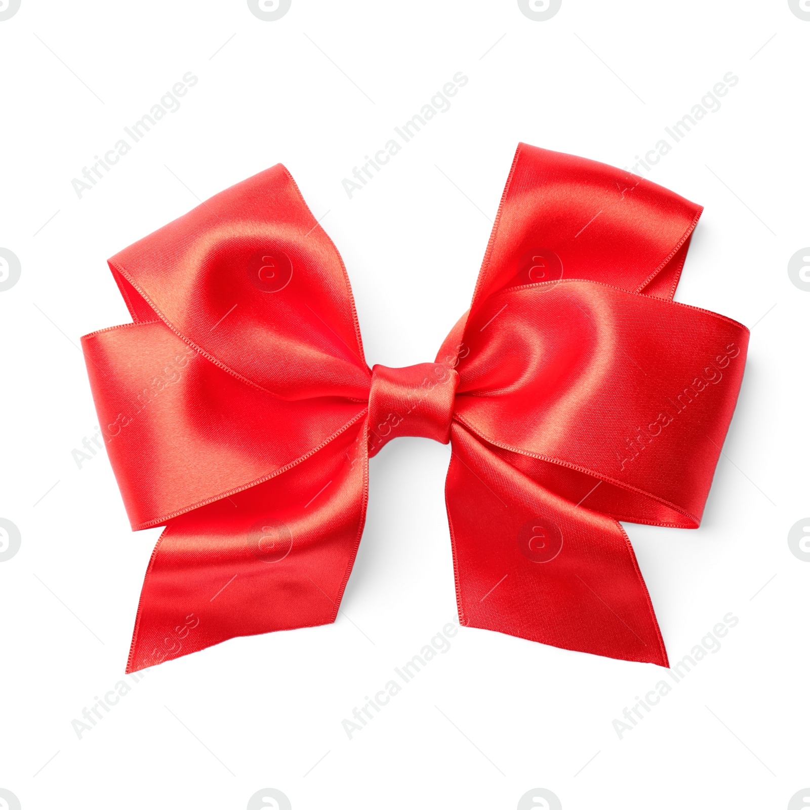 Photo of Red ribbon with bow on white background. Festive decoration