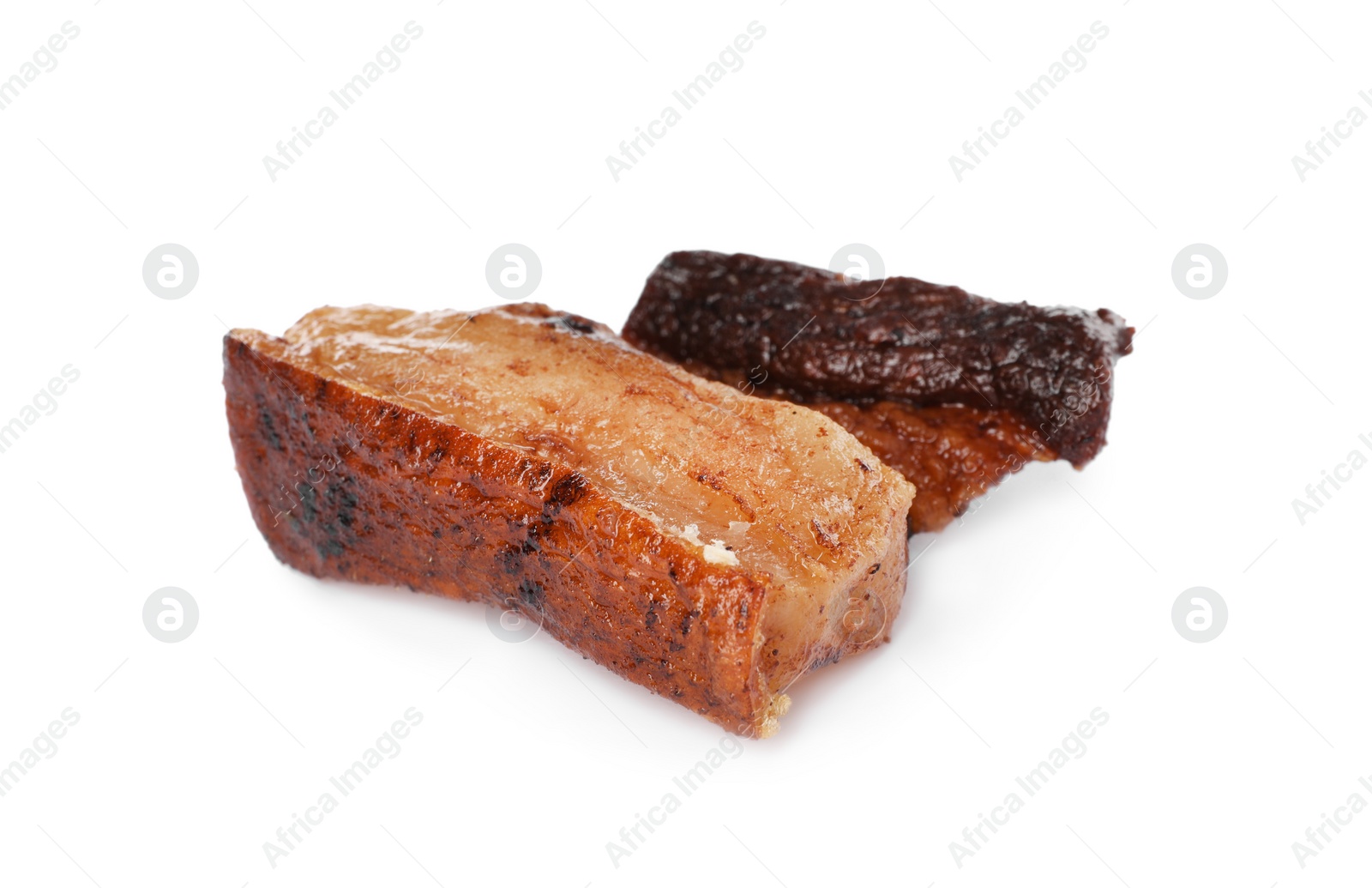 Photo of Tasty fried crackling on white background. Cooked pork lard