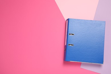 Photo of Blue office folder on color background, top view, Space for text