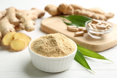 Photo of Dry and fresh ginger on white table