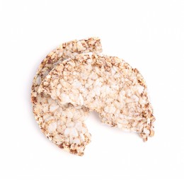 Photo of Tasty crunchy buckwheat on white background, top view