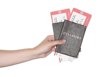 Photo of Woman holding passports with tickets isolated on white, closeup