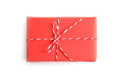 Photo of Beautifully wrapped gift box on white background, top view