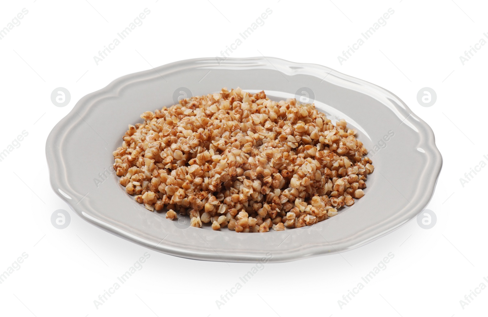 Photo of Plate with tasty buckwheat isolated on white