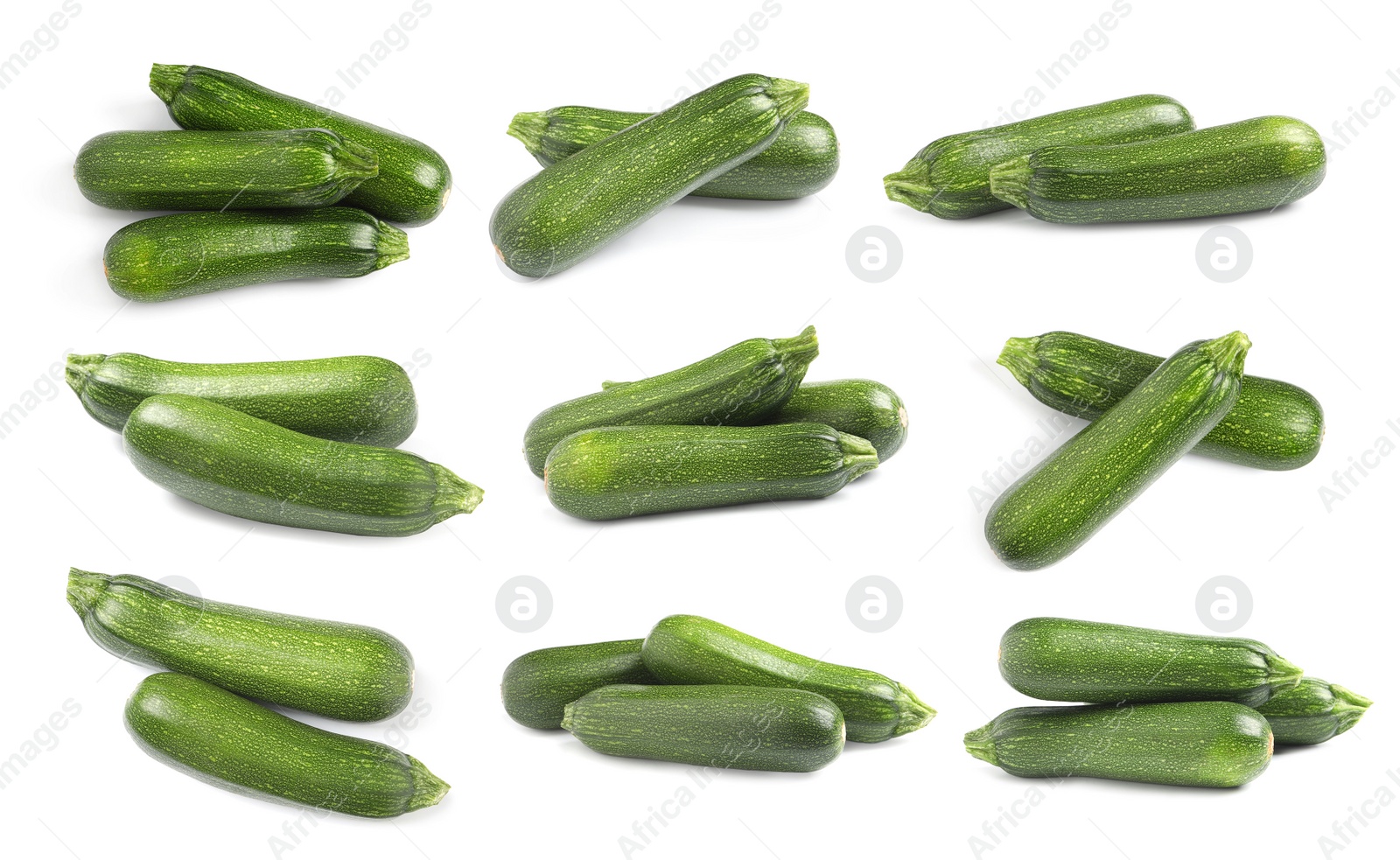 Image of Set of fresh ripe zucchinis on white background