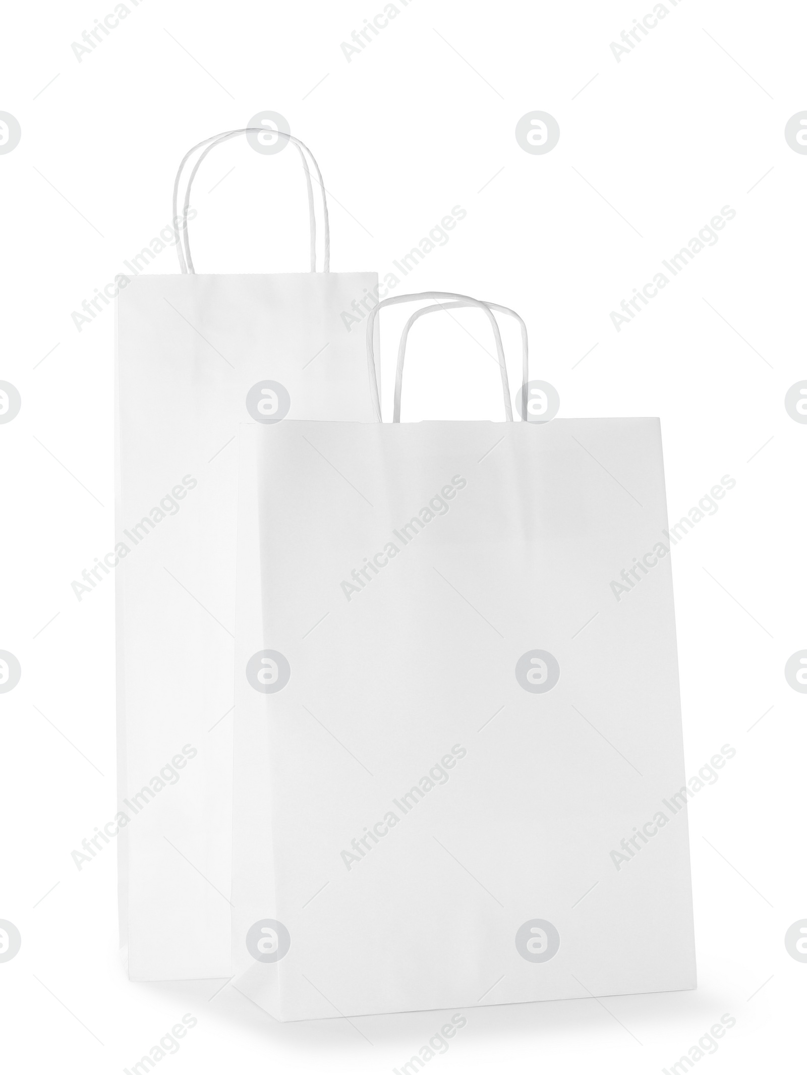 Photo of Two paper shopping bags isolated on white