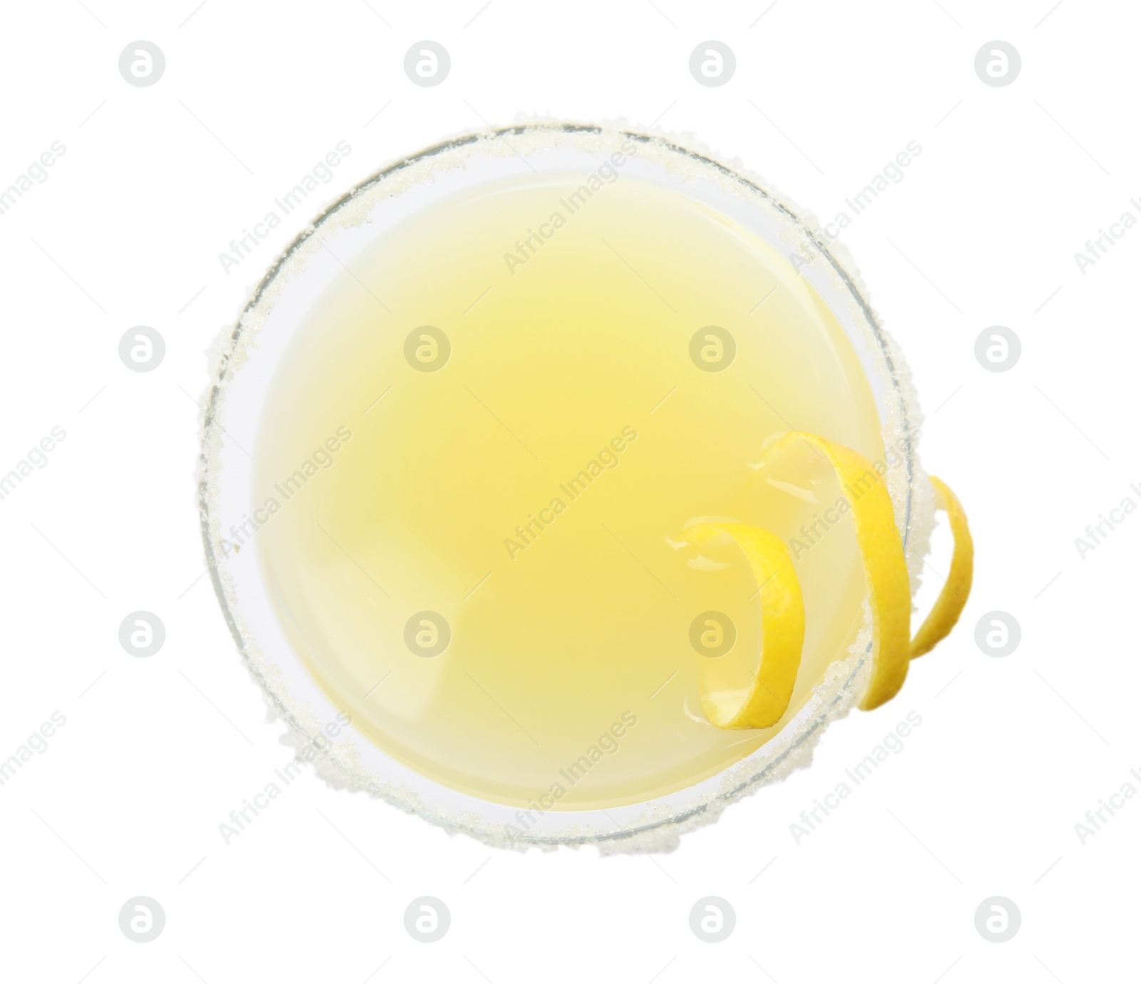Photo of Glass of delicious bee's knees cocktail with sugar rim and lemon twist isolated on white, top view