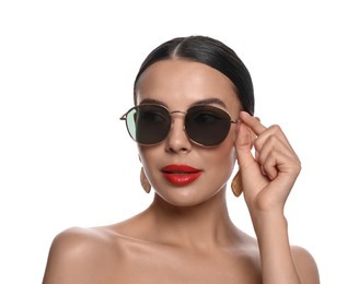 Photo of Attractive woman wearing fashionable sunglasses on white background