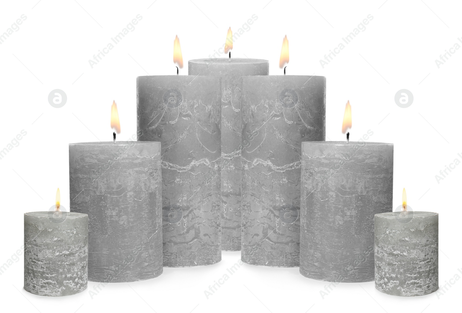 Image of Set of burning grey candles on white background