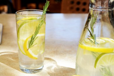 Summer refreshing lemonade drink on light table