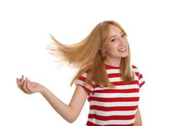 Portrait of beautiful young woman with blonde hair on white background