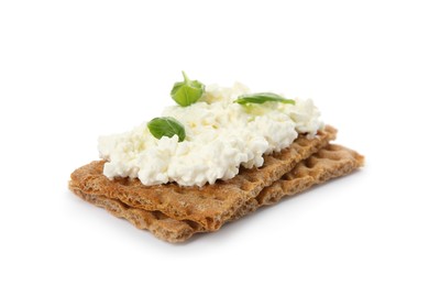 Photo of Crispy crackers with cottage cheese and basil on white background