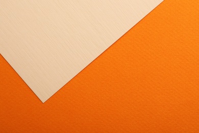 Photo of Colorful paper sheets as background, top view