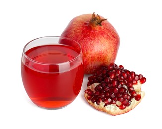 Photo of Refreshing pomegranate juice in glass and fruits isolated on white