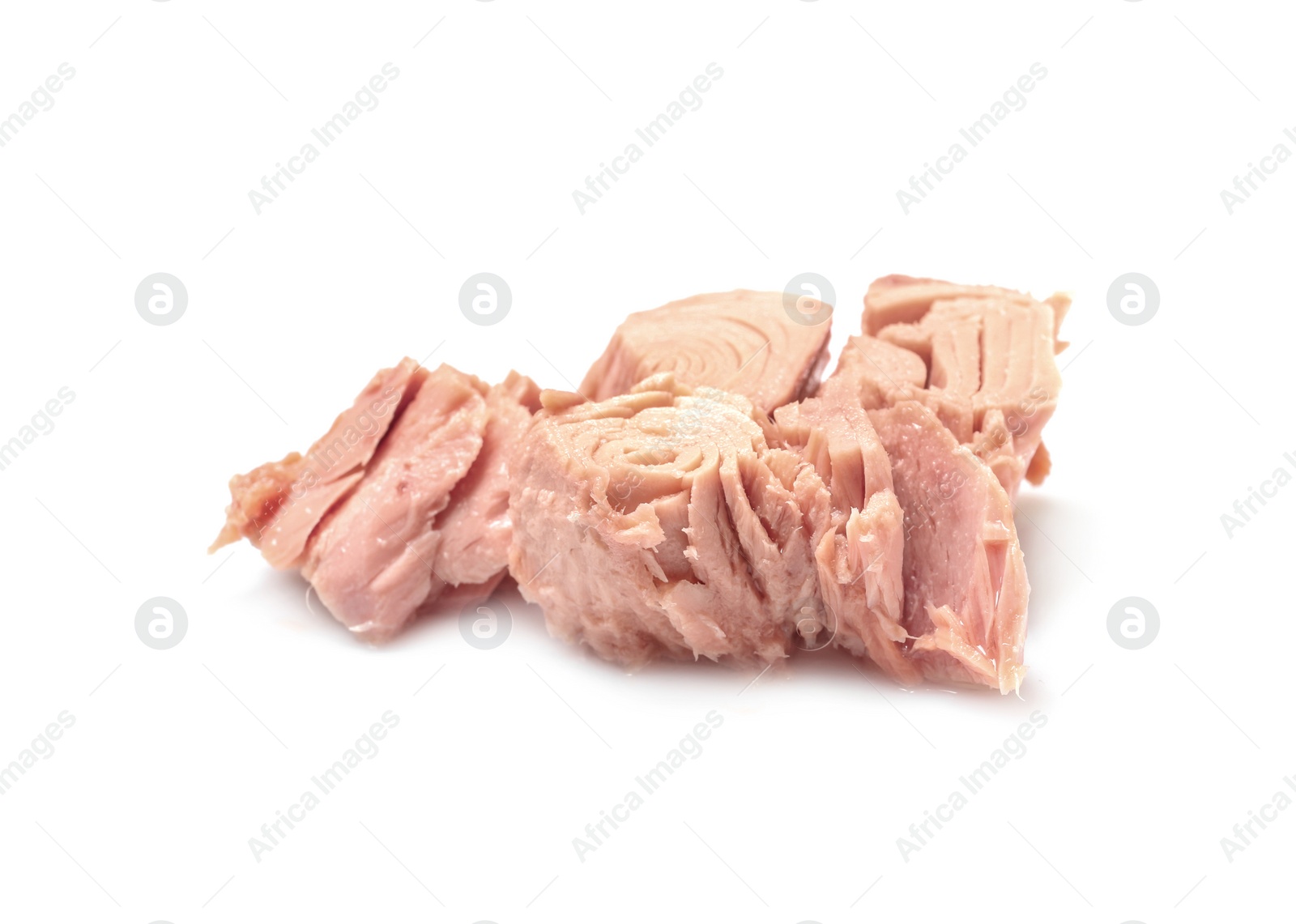 Photo of Pieces of canned tuna on white background