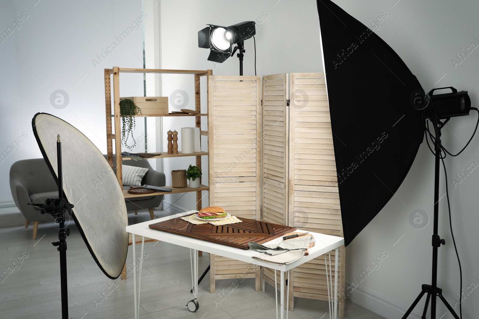 Photo of Tasty sandwich on table in photo studio. Food photography