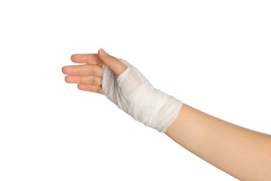 Photo of Woman with hand wrapped in medical bandage on white background, closeup