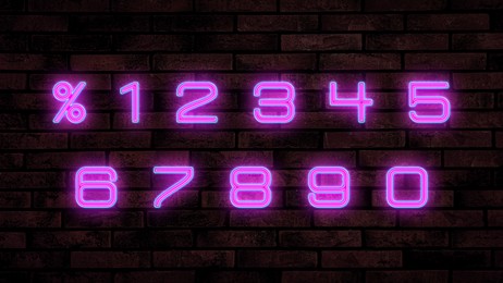 Image of Glowing neon number and percent signs on brick wall