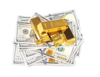 Shiny gold bars and money on white background