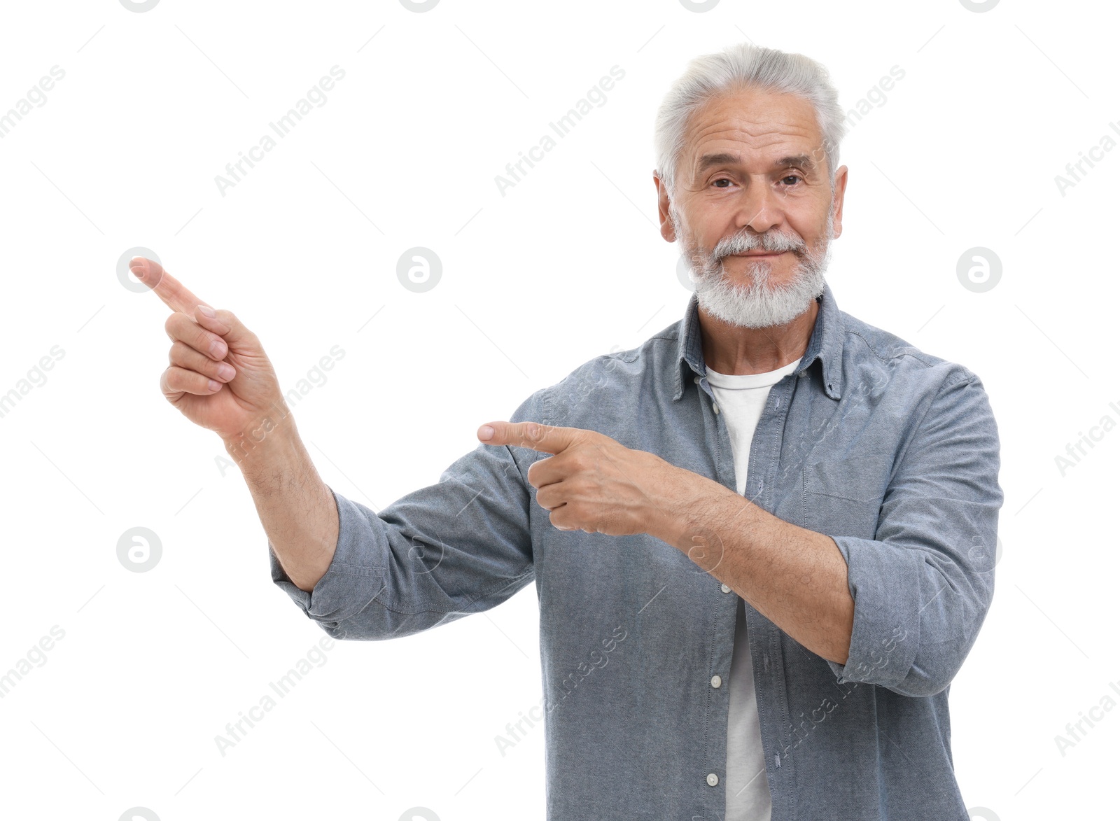 Photo of Special promotion. Senior man pointing at something on white background