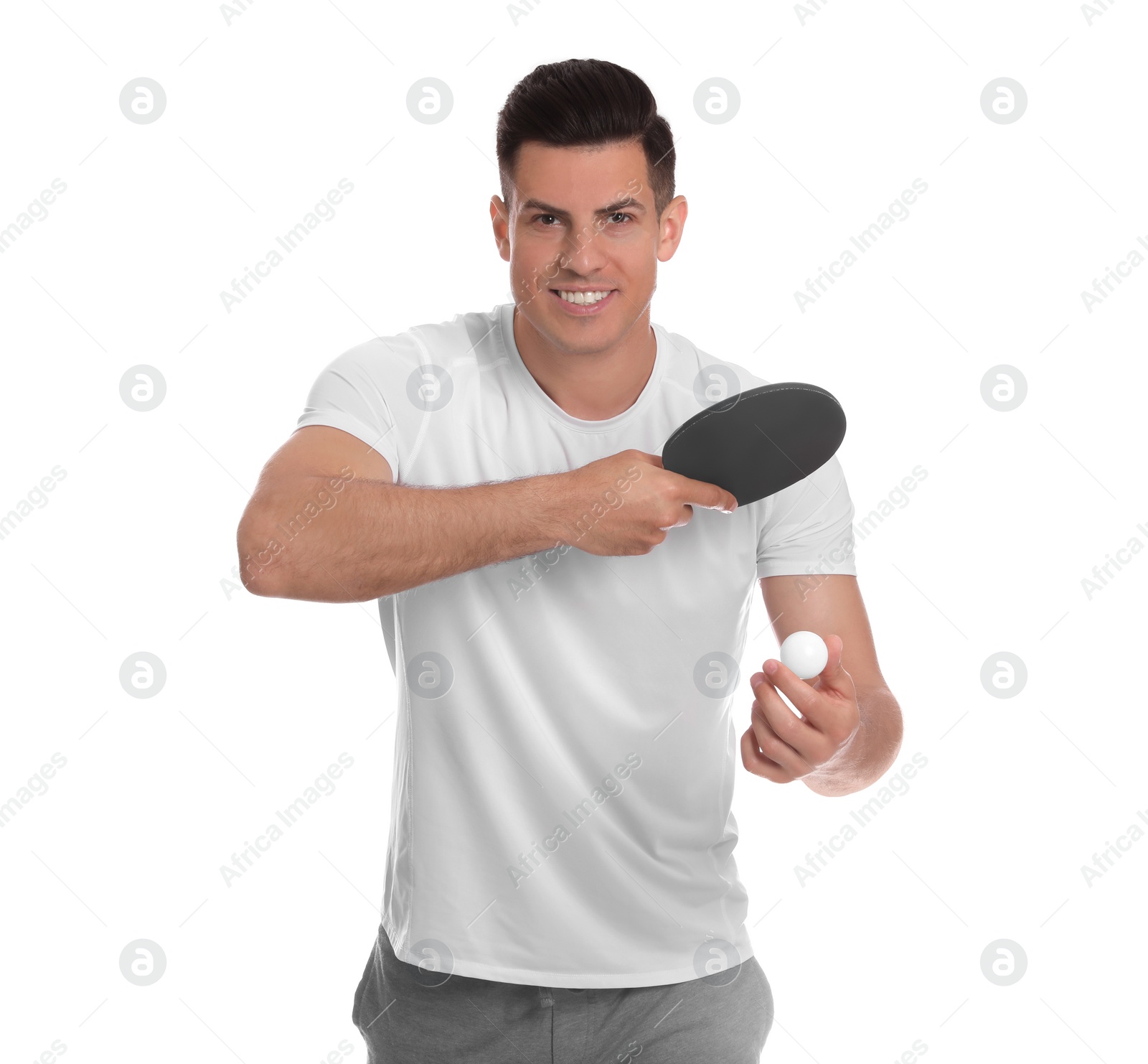 Photo of Handsome man with table tennis racket and ball on white background. Ping pong player