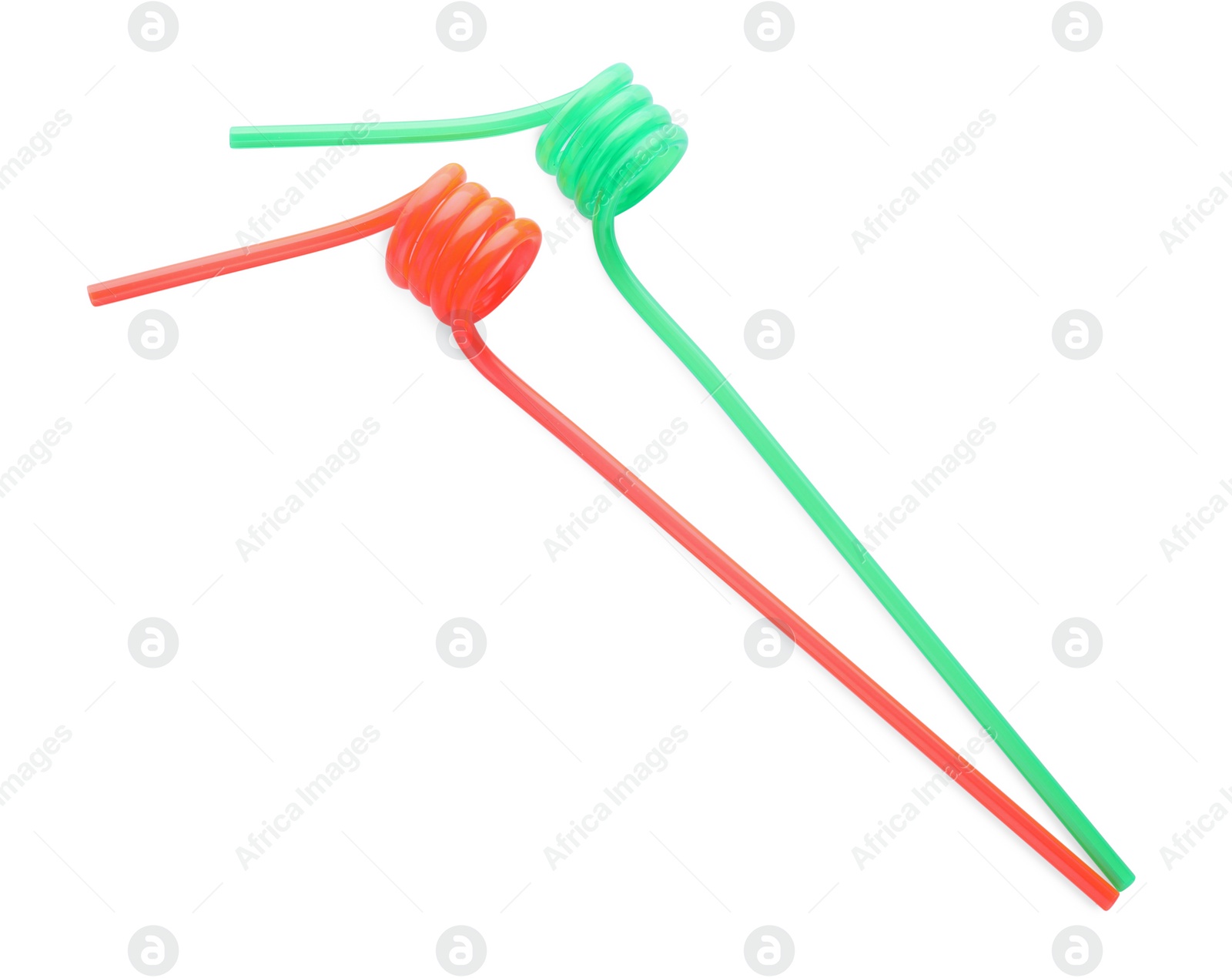 Photo of Color plastic cocktail tubes on white background, top view