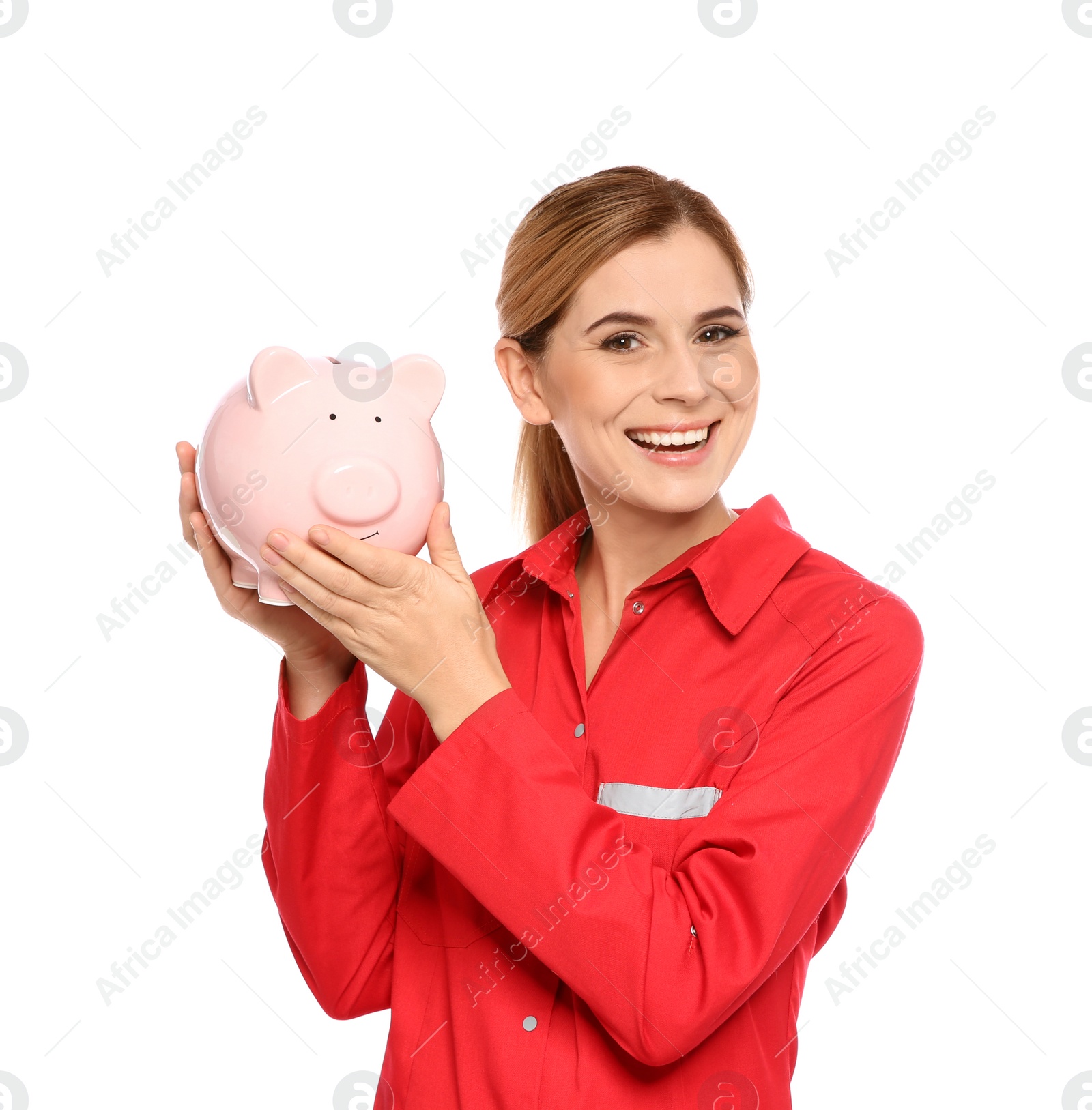 Photo of Portrait of female emergency doctor with piggy bank on white background