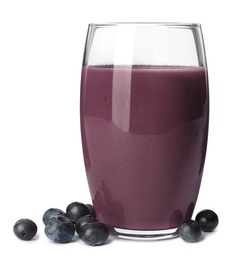 Photo of Glass of acai drink with berries on white background