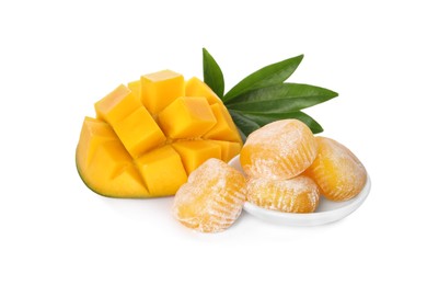 Photo of Delicious mochi with green leaves and mango on white background. Traditional Japanese dessert