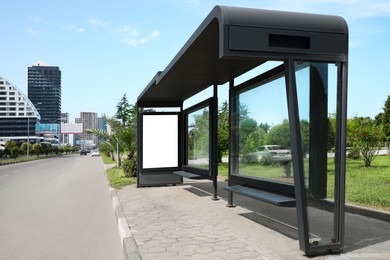 Photo of Public transport stop with benches on city street